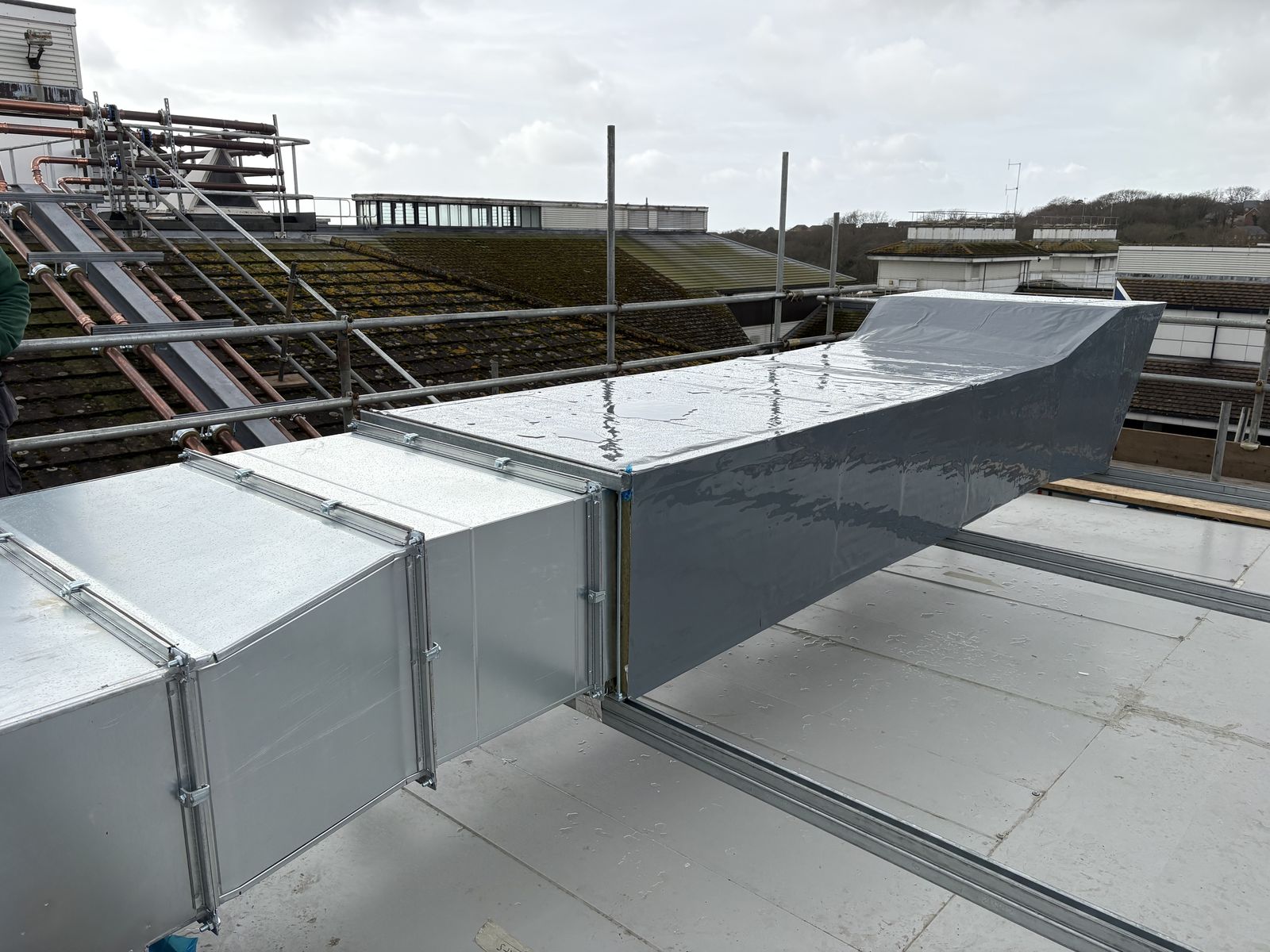 Rooftop ductwork installation by Alpha Thermal